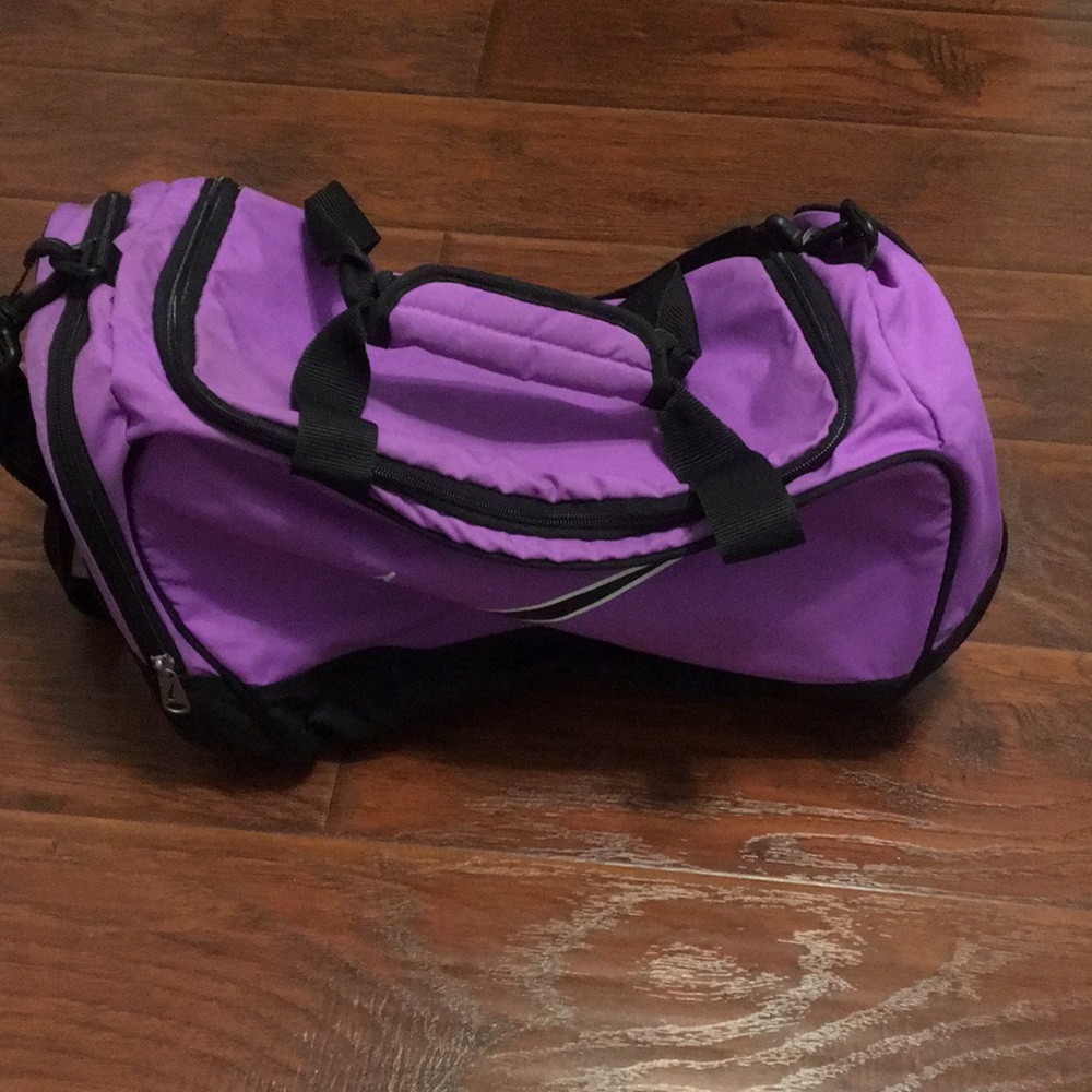 Small purple Nike duffel bag